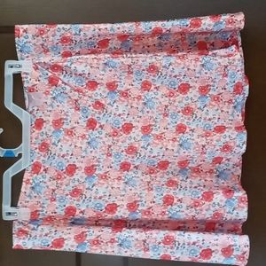 Mini skirt brand No Boundaries. It is red pink blue white flower print.
